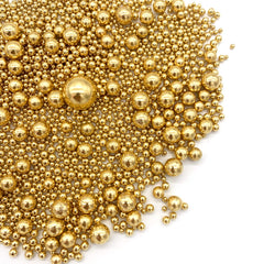 Closeup of Weraru gold pearl sugar sprinkles highlighting shimmering pearls for desserts