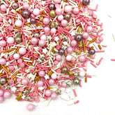 Weraru rose and gold sprinkles in a shaker jar for festive cake and cookie decorations