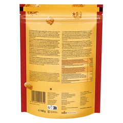Werther's Original caramel popcorn closeup reveals rich caramel and crisp popcorn texture.