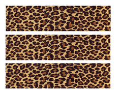 Whimsical Practicality leopard edible icing image border strip enhances a decorated cake