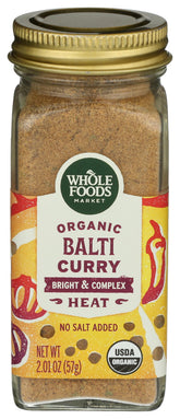 Whole Foods Market Organic Balti Curry Seasoning jar label for quick flavorful curries.