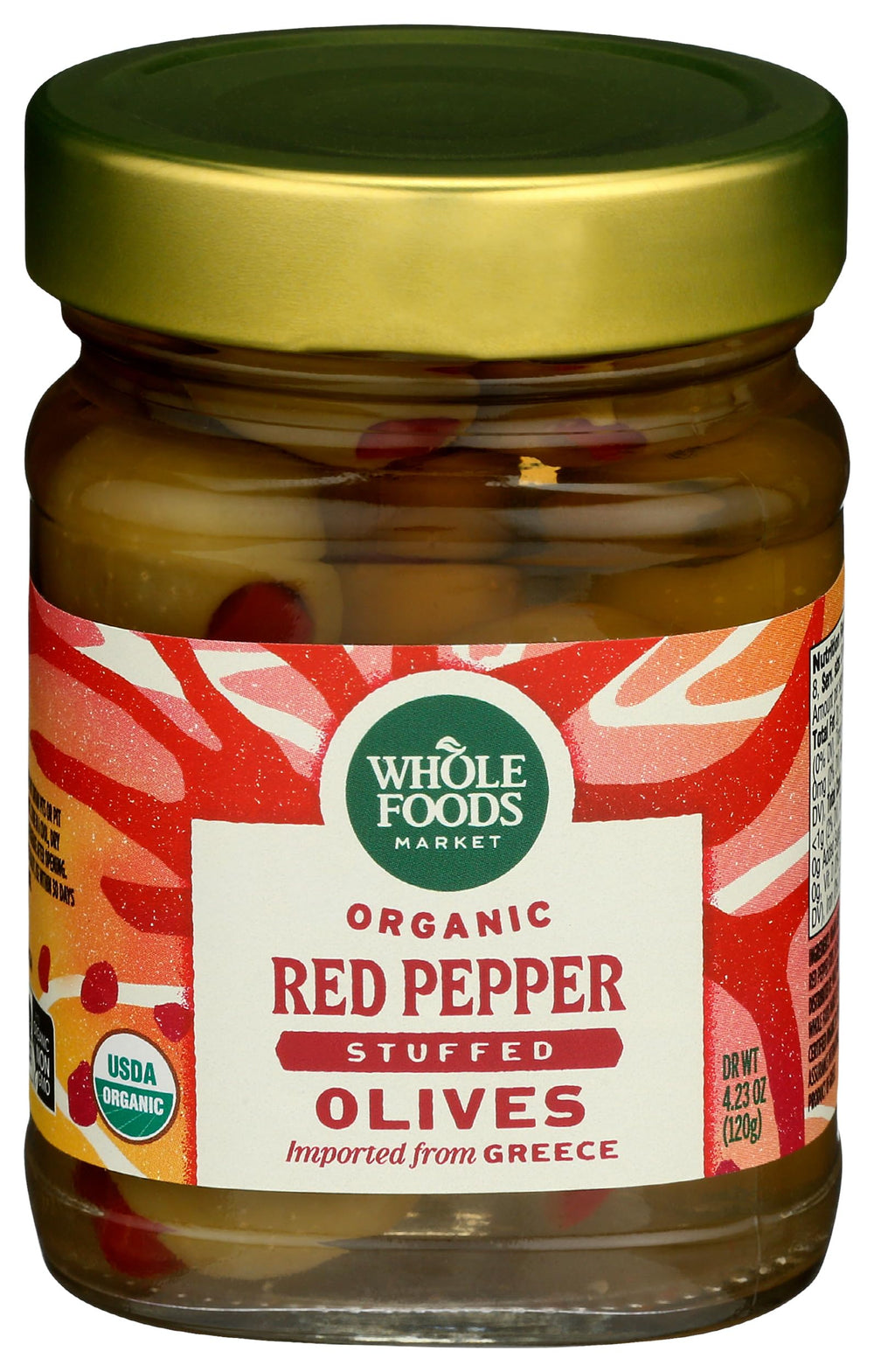 Whole Foods Market organic red pepper stuffed olives in a pack, ideal for antipasti.