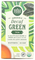 Whole Foods Market green decaf organic tea packaging highlights freshness and organic origin.
