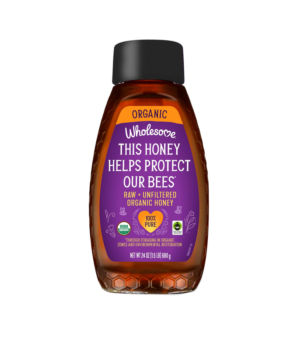 Wholesome organic raw honey bottle close-up for pure, versatile sweetness.