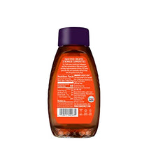 Wholesome Organic Honey pours with a golden stream perfect for tea.