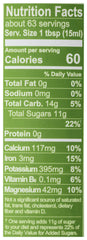 Close-up of Wholesome Molasses label showing organic and fair trade certifications.