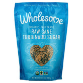 Wholesome Organic Turbinado Sugar crystals in a jar, ideal for coffee and baking.