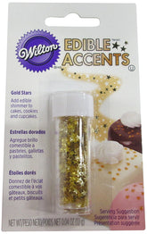 Wilton edible gold star sprinkles topping a birthday cake for a refined finish.