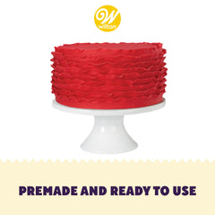 Rolled and smoothed Wilton red fondant for even cake coverage.