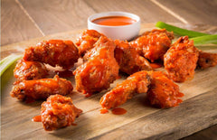 Drizzled over ribs with WINGERS Amazing Sauce for a sweet-spicy finish