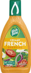 Dipping vegetables into Wish-Bone Creamy French Dressing.