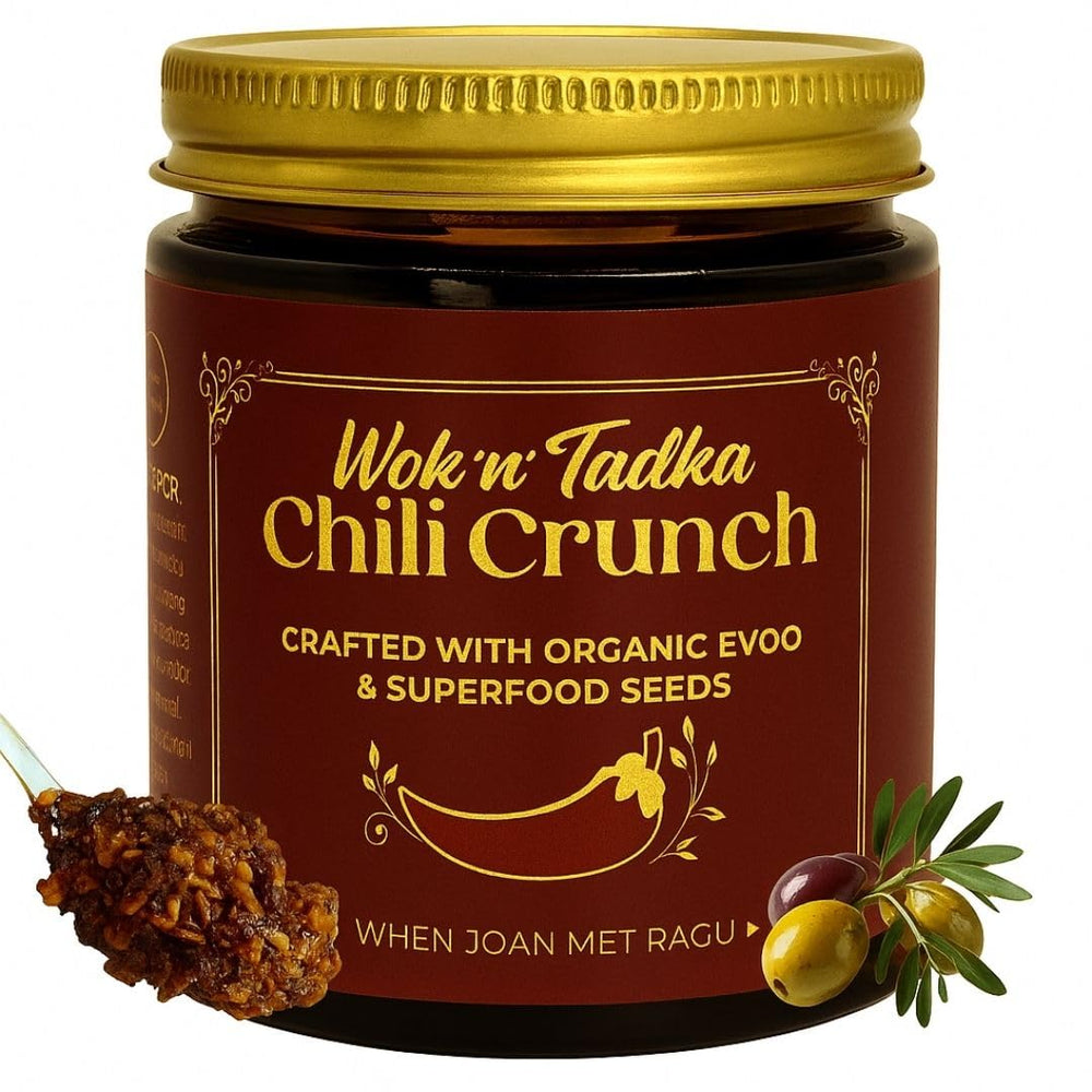 Wok n Tadka Garlic Chili Crunch bottle pouring for a spicy finish on pasta