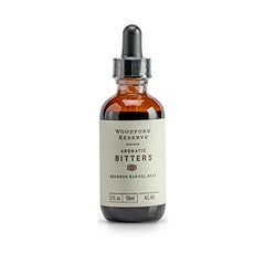 Woodford Reserve Aromatic Bitters bottle pour, enhancing cocktails with a refined aromatic blend