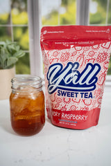 Y’all Sweet Tea Raspberry glass serving showcasing refreshing color for sunny afternoons.
