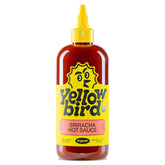 Yellowbird Organic Sriracha bottle front view for adding spicy-sweet flavor to meals.