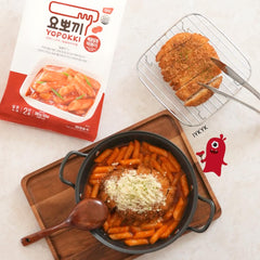 Yopokki cooking steps image showing simmering rice cakes and sauce.