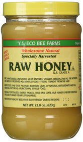 YS Eco Bee Farms Raw Honey bottle with amber drizzle, ideal for natural sweetening.