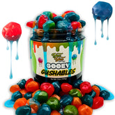 Yum Yum Delights Gooey Gushables jar front, vibrant blue glaze, ideal party snack.