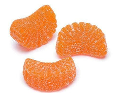 Yummy Chew orange slices candy plate display with vibrant color for desserts and buffets.