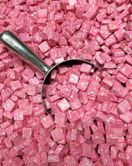 YummyLand All Pink chewy sweets on a dessert table add festive charm