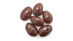 Yupik dark chocolate almonds served on a plate for movie night.