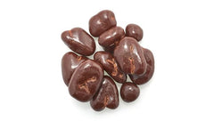 Yupik Dark Chocolate Pecans dipped bite displaying smooth chocolate and nutty sweetness