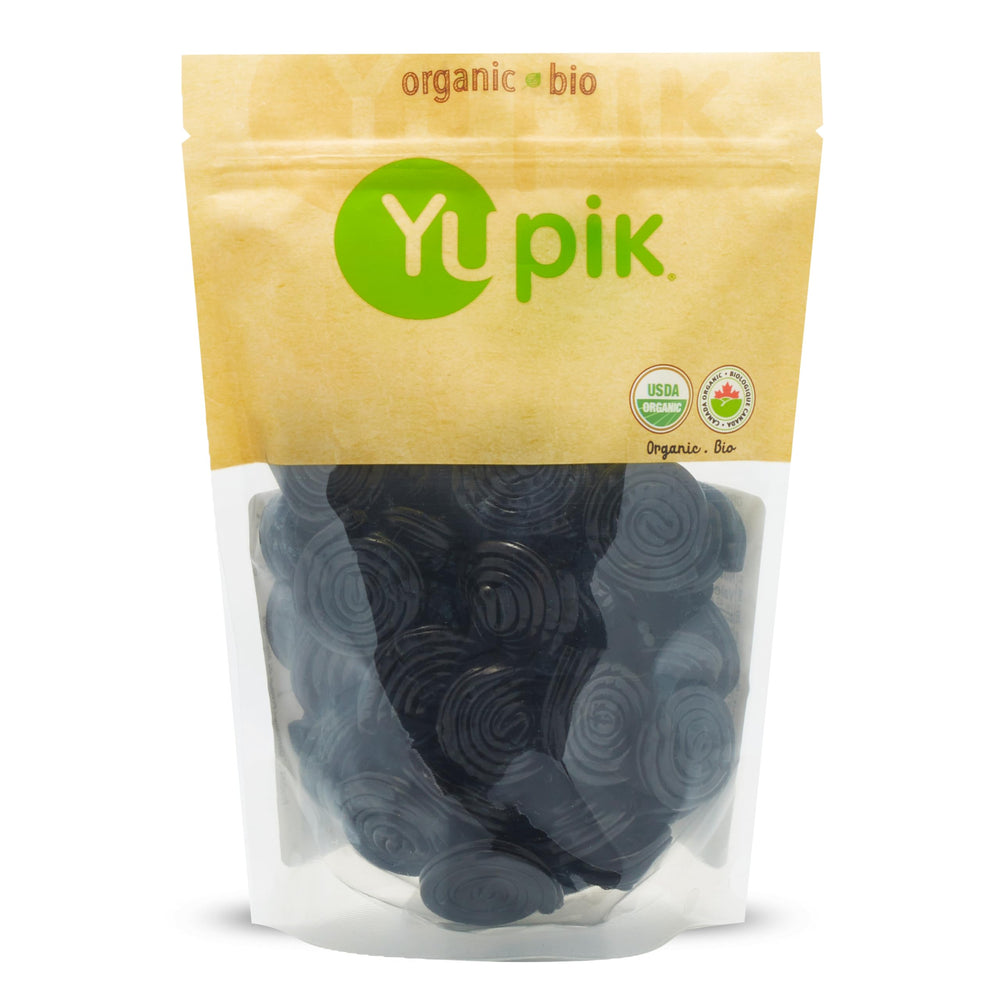 Yupik organic black licorice rolls in helix shape, a chewy snack.
