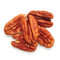 Close-up of Yupik pecans highlighting rich texture ideal for baking or topping yogurt.