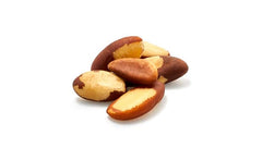 Yupik Raw Brazil Nuts on yogurt, a wholesome topping with selenium.