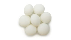 Stacked Yupik Scotch Mints showing uniform rounds