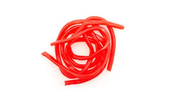 Yupik Strawberry Licorice Laces closeup shows chewy texture and vivid color.