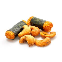 Yupik Sushi Cashew Mix cashews in a bowl, creamy contrast with crunchy crackers for a tasty snack.