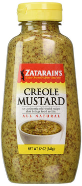 Zatarain's Creole Mustard bottle close-up for bold flavor on sandwiches.