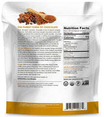 Zint cacao powder scoop in a glass cup, perfect for shakes and desserts.