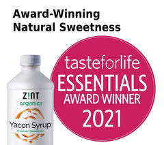 Zint Yacon Syrup being poured into a glass for a prebiotic boost.