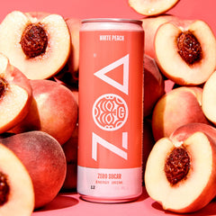 ZOA White Peach being poured into a glass for a refreshing energy boost