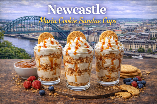 Two chilled Newcastle Maria Cookie Sundae Cups layered with Maria cookie crumbs, cheesecake cream, marshmallow ribbon, caramel drizzle and a light ruby sugar finish, styled for the BoroPantry UK grocery blog.
