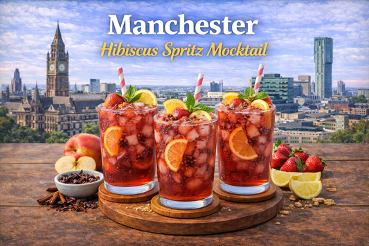 Manchester hibiscus spritz mocktail made with hibiscus tea, blackberry white tea, peach green tea and strawberry syrup from BoroPantry