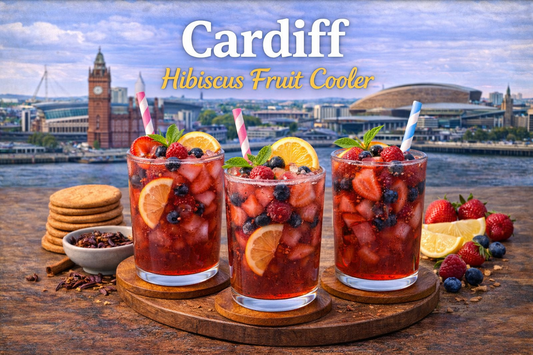 Cardiff Hibiscus Fruit Cooler served over ice with raspberry herbal tea, hibiscus flowers, lime crystals and cherry limeade sparkle from BoroPantry