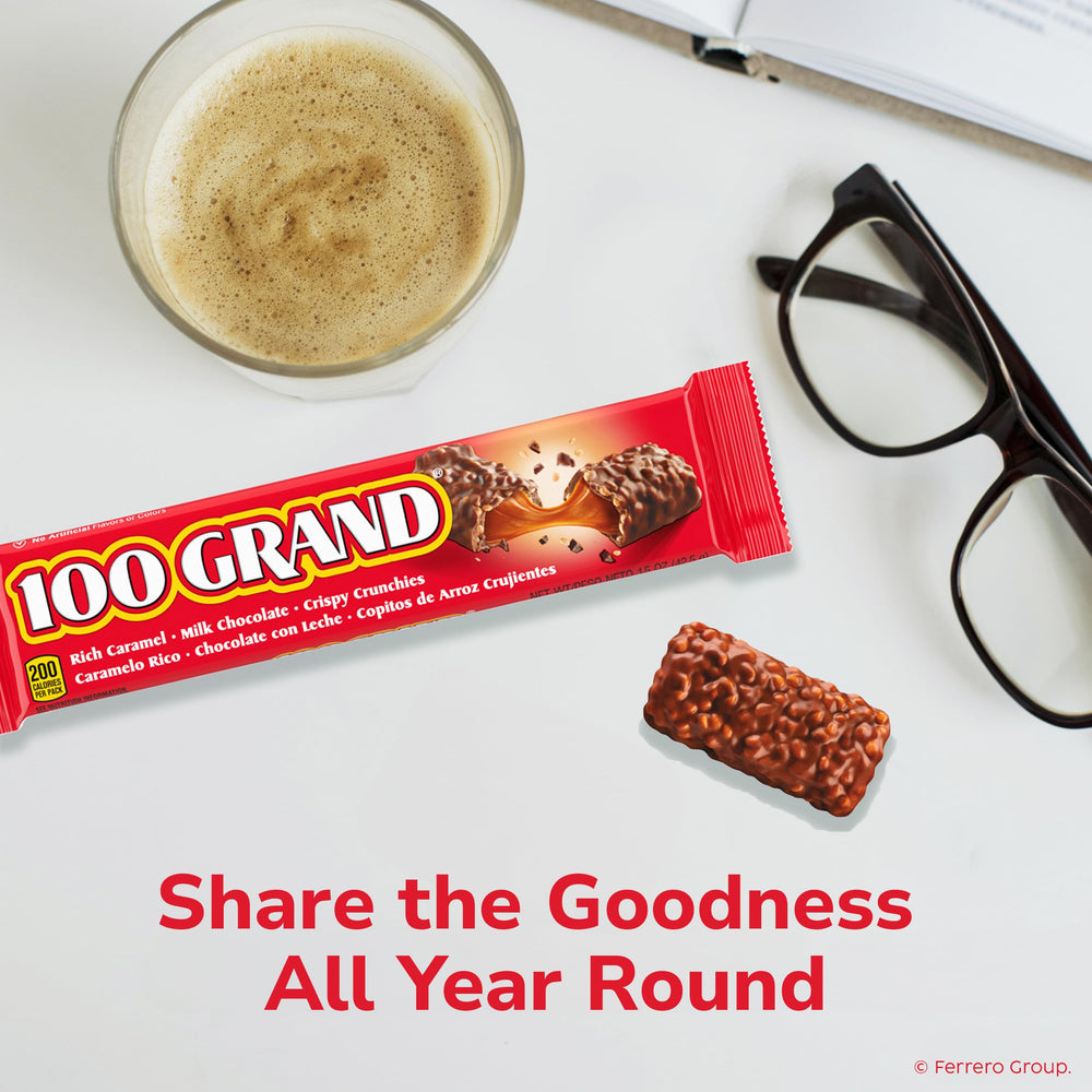 100 Grand bars on office desk, ideal for sharing during breaks.