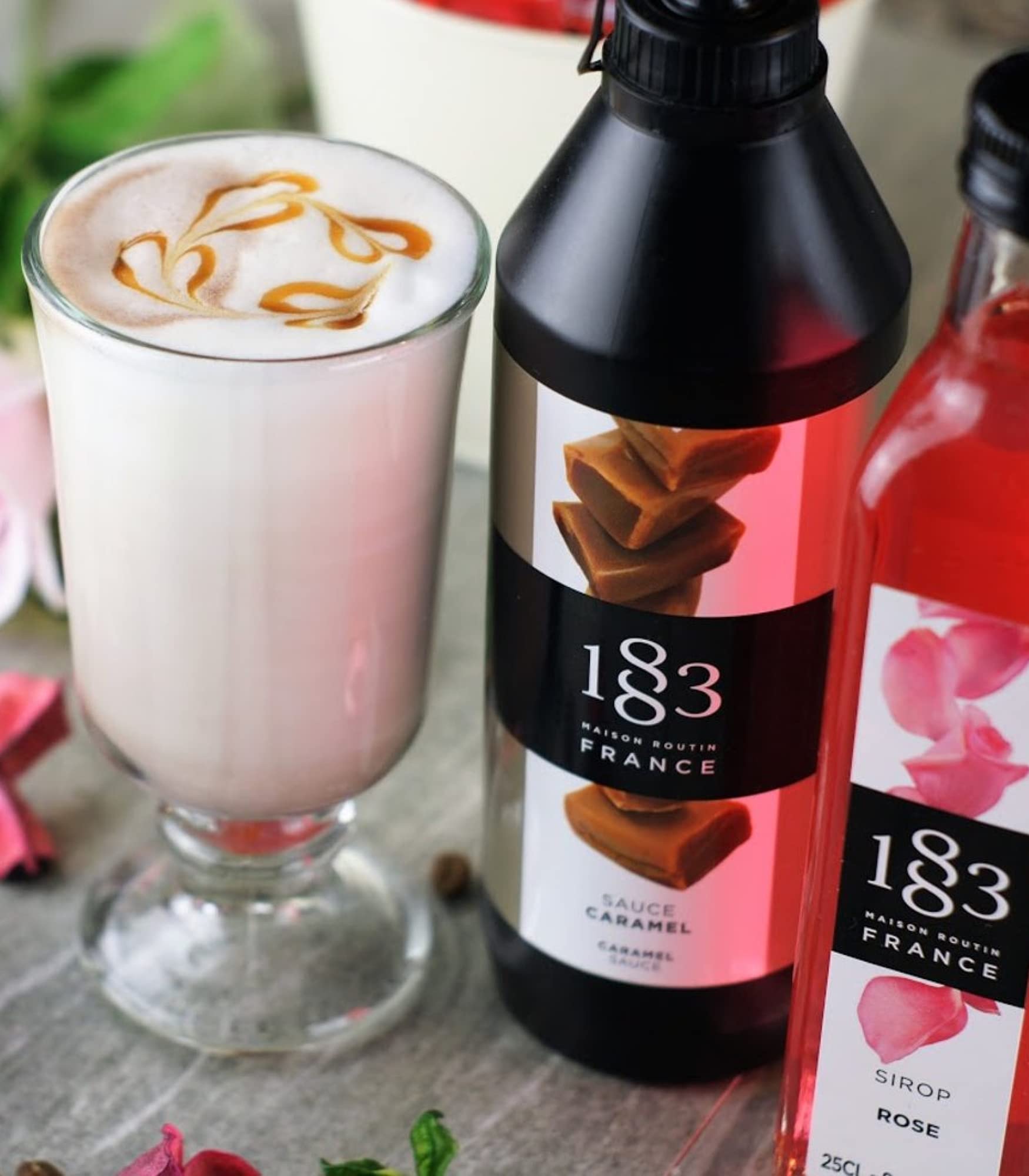 Syrup used as a dessert topping for an elegant dessert setup