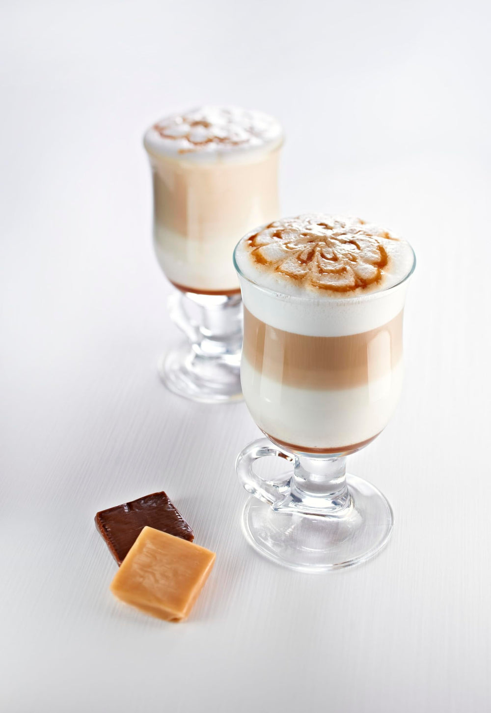 1883 sugar-free caramel syrup iced coffee glass with amber drizzle