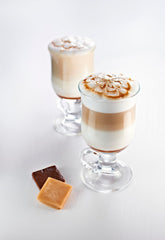 1883 sugar-free caramel syrup iced coffee glass with amber drizzle