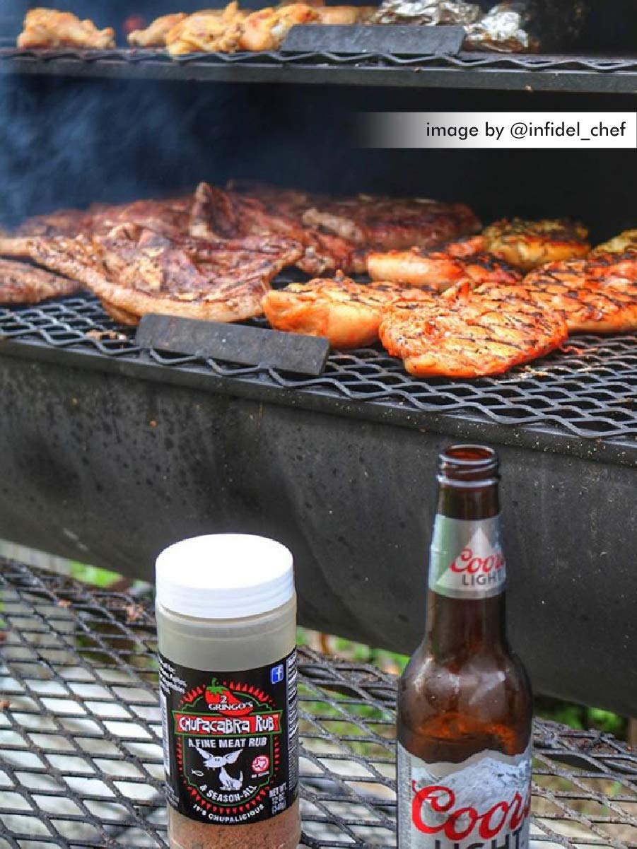 2 Gringos Chupacabra Original Seasoning being brushed onto ribs.