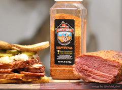 Ribnoxious Rub on grill releasing savory aroma