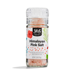 365 by Whole Foods Himalayan Pink Salt Grinder seen from the front, ideal for table seasoning.
