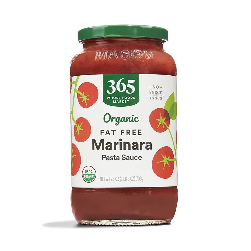 365 by Whole Foods Market marinara bottle pouring, rich flavor ready for quick weeknight meals.