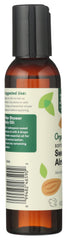 Amber glass bottle of almond oil emphasizing pure, organic product for daily use.