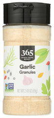 365 by Whole Foods Market garlic granules in a jar on a shelf for everyday seasoning