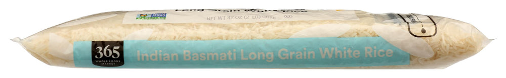365 by Whole Foods Market Indian Basmati White Rice steam rising, hinting at delicate fragrance.
